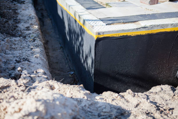 Professional Exterior Waterproofing technician working in Dalton, NY